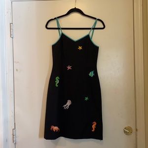 Black cute beach / fun dress with see creations